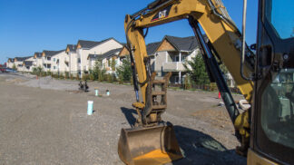mini excavator at a construction site