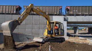 excavator digging at a construction site