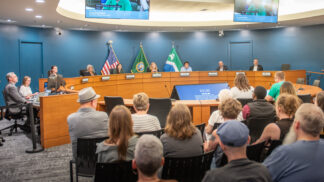 City Council seated at the dais during a Council meeting